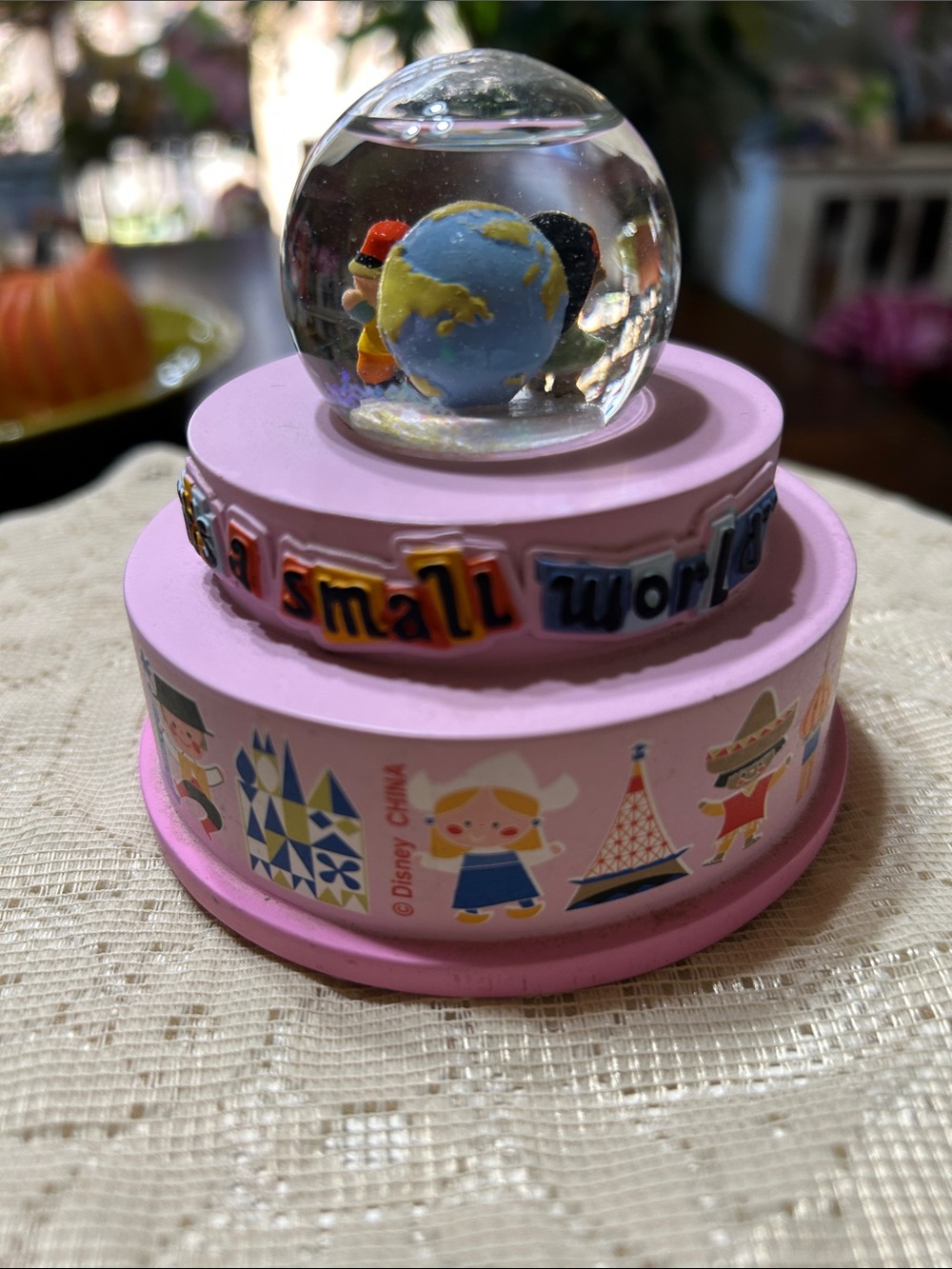 Disney Parks “It’s a Small World” Musical Snow Globe On a Tiered Pink Base - Picture 3 of 8
